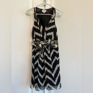 Milly of New York cocktail dress. Black, tan with gold detail